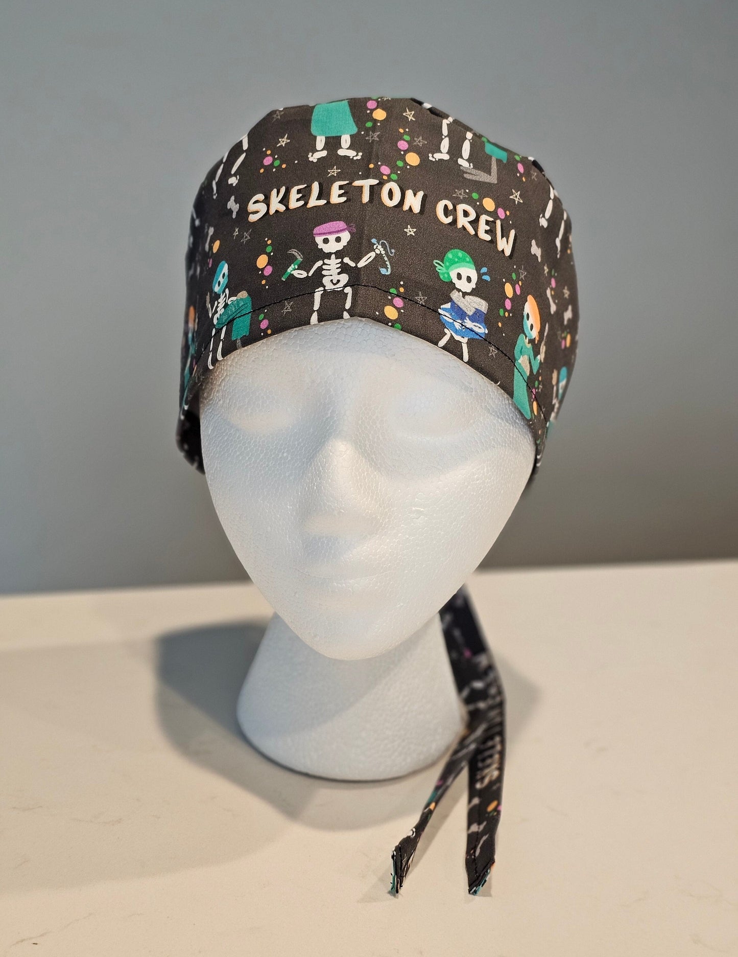 Skeleton Crew Scrub Caps in Bouffant, Euros, Ponytails, and Skull Cap